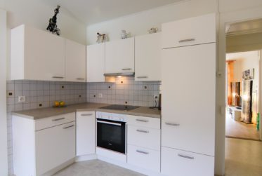 Ensemble de 2 immeubles avec restaurant et 5 appartements, rendement net >5%