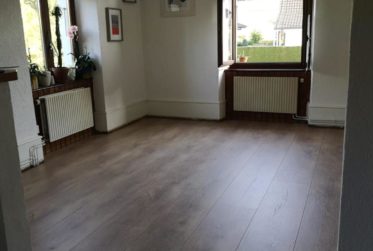 Appartement de 4.5 pièces avec jardin et place de parc