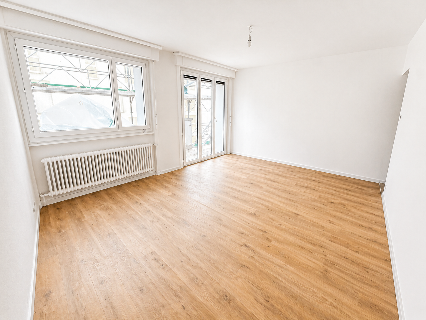 Pérolles à Fribourg : 3.5 pièces rénové avec deux balcons